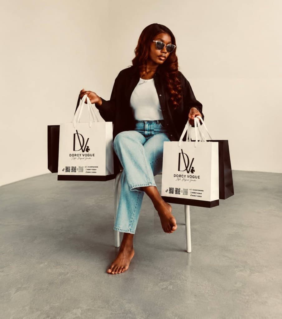 Dorcy Vogue Brand Model with Shopping Bags